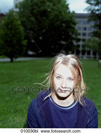 teenager outddoors with a sceptic look View Large Photo Image Stock Image - teenager outddoors with a sceptic look. Fotosearch