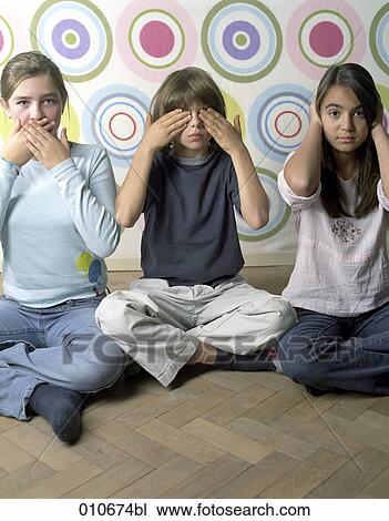 three children playing hear no evil see no evil speak no evil View Large Photo Image Stock Image - three children playing hear no evil see no evil speak no evil . Fotosearch