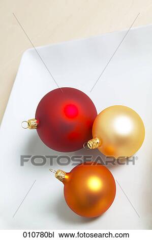 three christmas baubles View Large Photo Image Stock Image - three christmas baubles. Fotosearch