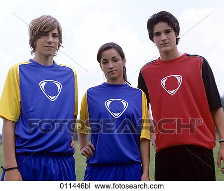 three teenagers wearing football dresses View Large Photo Image Stock Image - three teenagers wearing football dresses. Fotosearch