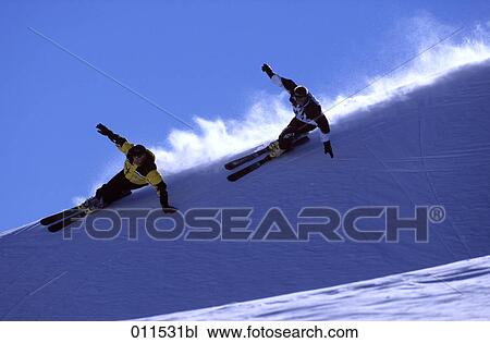 two men skiing View Large Photo Image Stock Image - two men skiing. Fotosearch