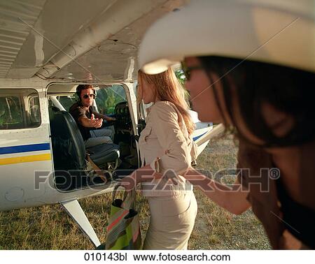 two women baording small propeller plane View Large Photo Image Stock Image - two women baording small propeller plane. Fotosearch