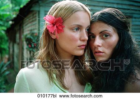 two young women being attracted to each other View Large Photo Image Stock Image - two young women being attracted to each other. Fotosearch