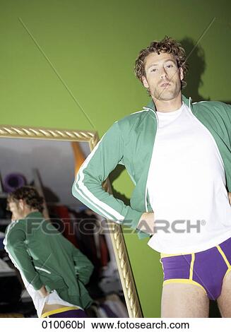 unshaved man in his underwear showing off View Large Photo Image Stock Image - unshaved man in his underwear showing off. Fotosearch
