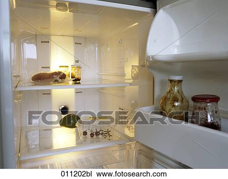 view into an almost empty refrigerator View Large Photo Image Stock Image - view into an almost empty refrigerator. Fotosearch