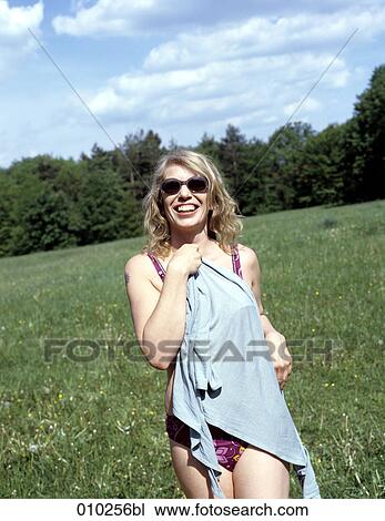 woman (35-40 years) in swimsuit walking towards camera View Large Photo Image Stock Image - woman (35-40 years) in swimsuit walking towards camera. Fotosearch