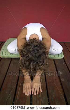 woman doing stretching exercises View Large Photo Image Stock Image - woman doing stretching exercises. Fotosearch