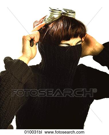 woman hiding face in roll-neck pullover and welding glasses on her head View Large Photo Image Stock Image - woman hiding face in roll-neck pullover and welding glasses on her head. Fotosearch