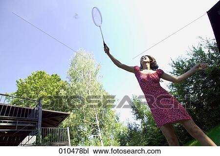 woman in garden playing badminton View Large Photo Image Stock Image - woman in garden playing badminton. Fotosearch