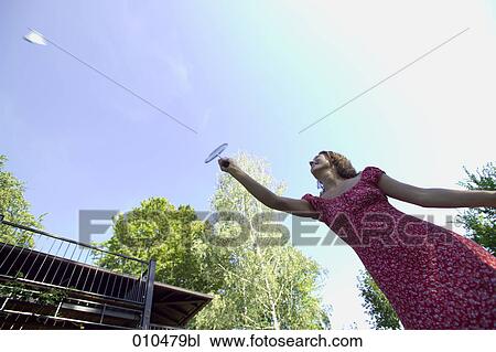 woman in garden playing badminton View Large Photo Image Stock Image - woman in garden playing badminton. Fotosearch