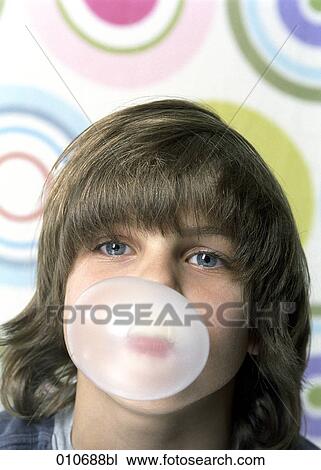 young boy blowing bubblegum View Large Photo Image Stock Image - young boy blowing bubblegum. Fotosearch