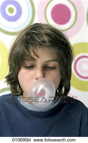 young boy blowing bubblegum View Large Photo Image Stock Image - young boy blowing bubblegum. Fotosearch