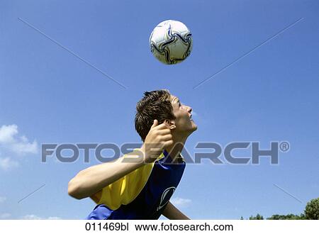 young football player exercising header View Large Photo Image Stock Image - young football player exercising header. Fotosearch