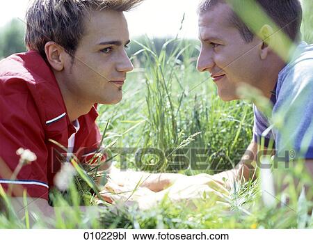 young gay (20-25 years) man admiring his partner View Large Photo Image Stock Image - young gay (20-25 years) man admiring his partner. Fotosearch