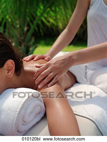 young woman being massaged View Large Photo Image Stock Image - young woman being massaged. Fotosearch