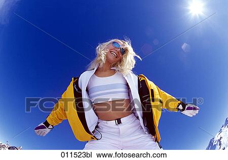 young woman smiling in the winter sun View Large Photo Image Stock Image - young woman smiling in the winter sun. Fotosearch