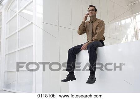 businessman talking on his mobile View Large Photo Image Stock Image - businessman talking on his mobile. Fotosearch