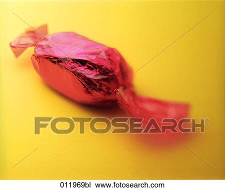 candy in red wrapping View Large Photo Image Stock Image - candy in red wrapping. Fotosearch