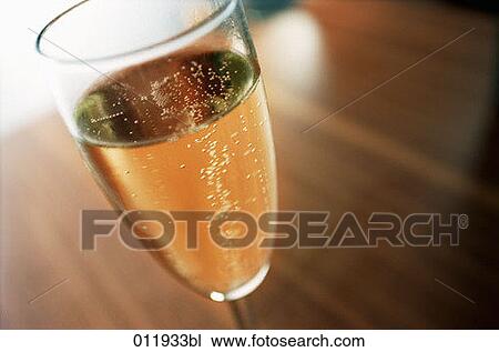 Stock Image - close-up of champagne glass. Fotosearch