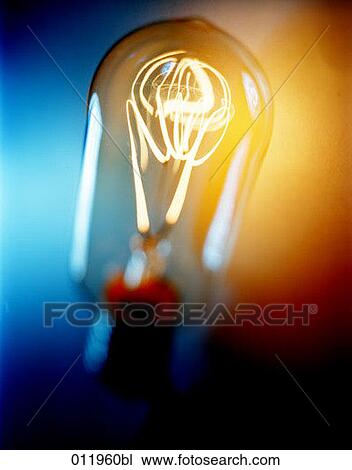 close-up of glowing light bulb View Large Photo Image Stock Image - close-up of glowing light bulb. Fotosearch