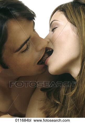 close-up of young couple sharing a piece of chocolate View Large Photo Image Stock Image - close-up of young couple sharing a piece of chocolate. Fotosearch