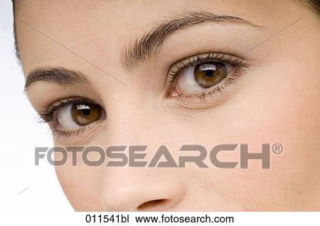 eyes of young woman looking into camera View Large Photo Image Stock Image - eyes of young woman looking into camera. Fotosearch