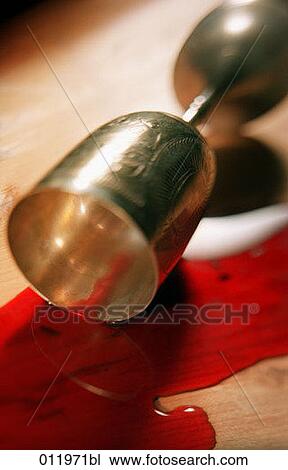fallen chalice spilling red wine View Large Photo Image Stock Image - fallen chalice spilling red wine. Fotosearch