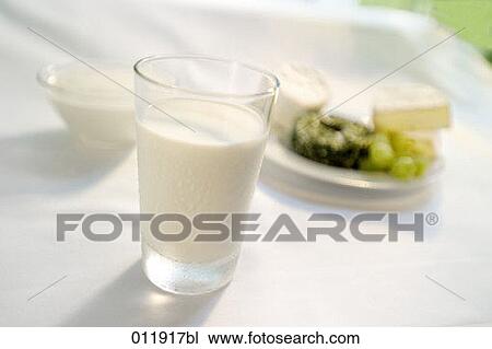 glass of milk on a table View Large Photo Image Stock Image - glass of milk on a table. Fotosearch