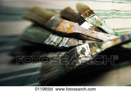 group of paint brushes lying on cloth View Large Photo Image Stock Image - group of paint brushes lying on cloth. Fotosearch