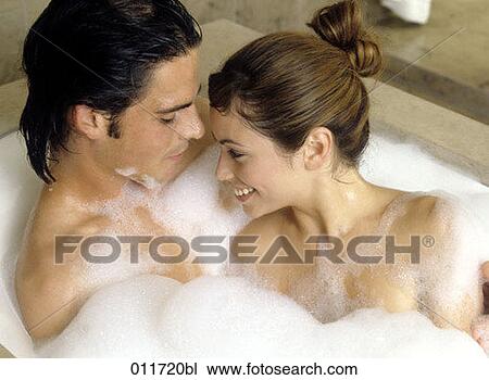 Stock Image - joyous couple in bathtub. Fotosearch