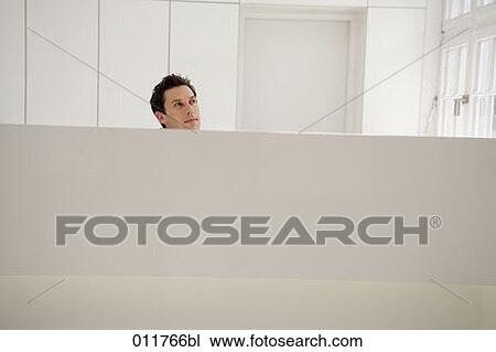 male receptionist looking thoughtful View Large Photo Image Stock Image - male receptionist looking thoughtful. Fotosearch