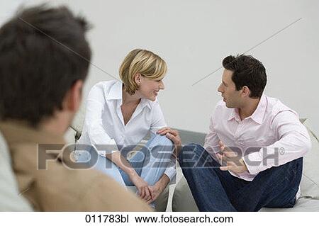 man and woman engaged in vivid conversation View Large Photo Image Stock Image - man and woman engaged in vivid conversation. Fotosearch