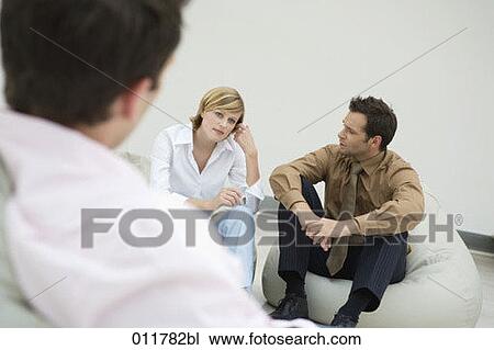 man and woman having a conversation View Large Photo Image Stock Image - man and woman having a conversation. Fotosearch
