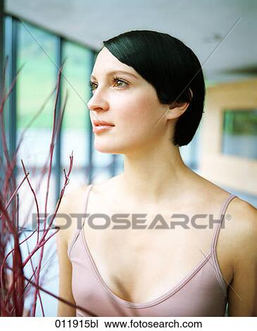 Stock Image - portrait of black haired young woman. Fotosearch