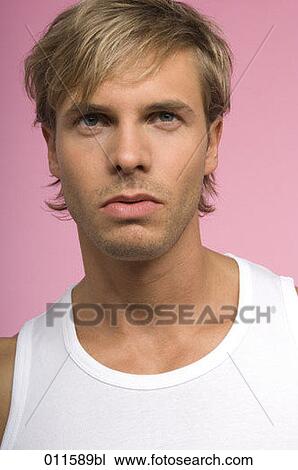 portrait of blond man in white undershirt View Large Photo Image Stock Image - portrait of blond man in white undershirt. Fotosearch
