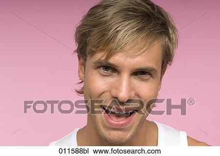 portrait of laughing young man View Large Photo Image Stock Image - portrait of laughing young man. Fotosearch