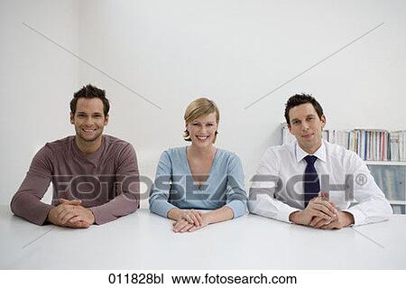 portrait of three smiling office workers View Large Photo Image Stock Image - portrait of three smiling office workers. Fotosearch