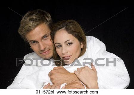portrait of young couple hugging each other View Large Photo Image Stock Image - portrait of young couple hugging each other. Fotosearch