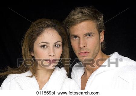 portrait of young couple wearing bathrobes View Large Photo Image Stock Image - portrait of young couple wearing bathrobes. Fotosearch