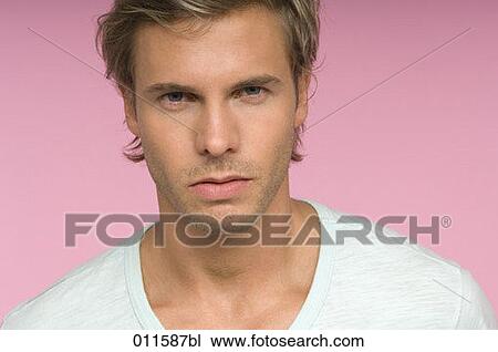 portrait of young man in white undershirt View Large Photo Image Stock Image - portrait of young man in white undershirt. Fotosearch