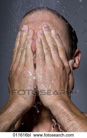 portrait of young man washing his face in a shower View Large Photo Image Stock Image - portrait of young man washing his face in a shower. Fotosearch