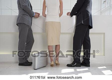 rear view of three business people waiting at reception View Large Photo Image Stock Image - rear view of three business people waiting at reception. Fotosearch