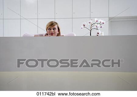 receptionist looking curious View Large Photo Image Stock Image - receptionist looking curious. Fotosearch