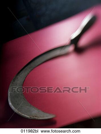 Stock Image - still life of sickle. Fotosearch