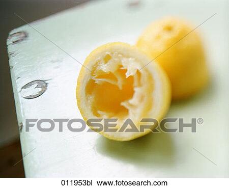 still life of squeezed lemons lying on a table View Large Photo Image Stock Image - still life of squeezed lemons lying on a table. Fotosearch