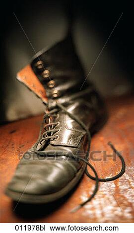 still life of worn out shoe View Large Photo Image Stock Image - still life of worn out shoe. Fotosearch
