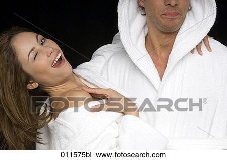 young couple playing around, woman winking View Large Photo Image Stock Image - young couple playing around, woman winking. Fotosearch