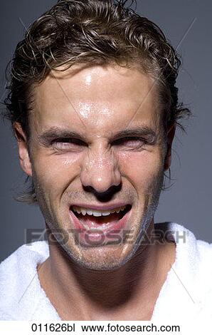young man after taking a shower making funny faces View Large Photo Image Stock Image - young man after taking a shower making funny faces. Fotosearch