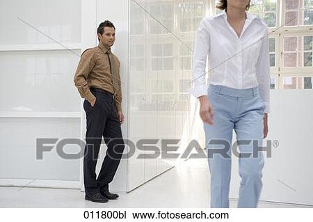 young man looking after woman passing by View Large Photo Image Stock Image - young man looking after woman passing by. Fotosearch