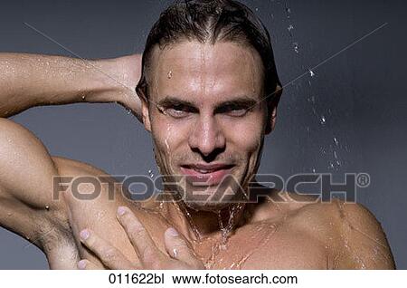 young man taking a shower View Large Photo Image Stock Image - young man taking a shower. Fotosearch